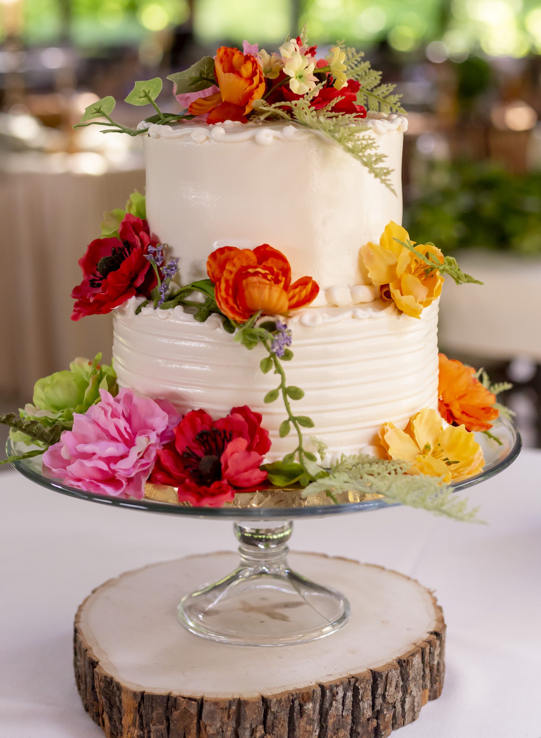 small white wedding cake with flowers