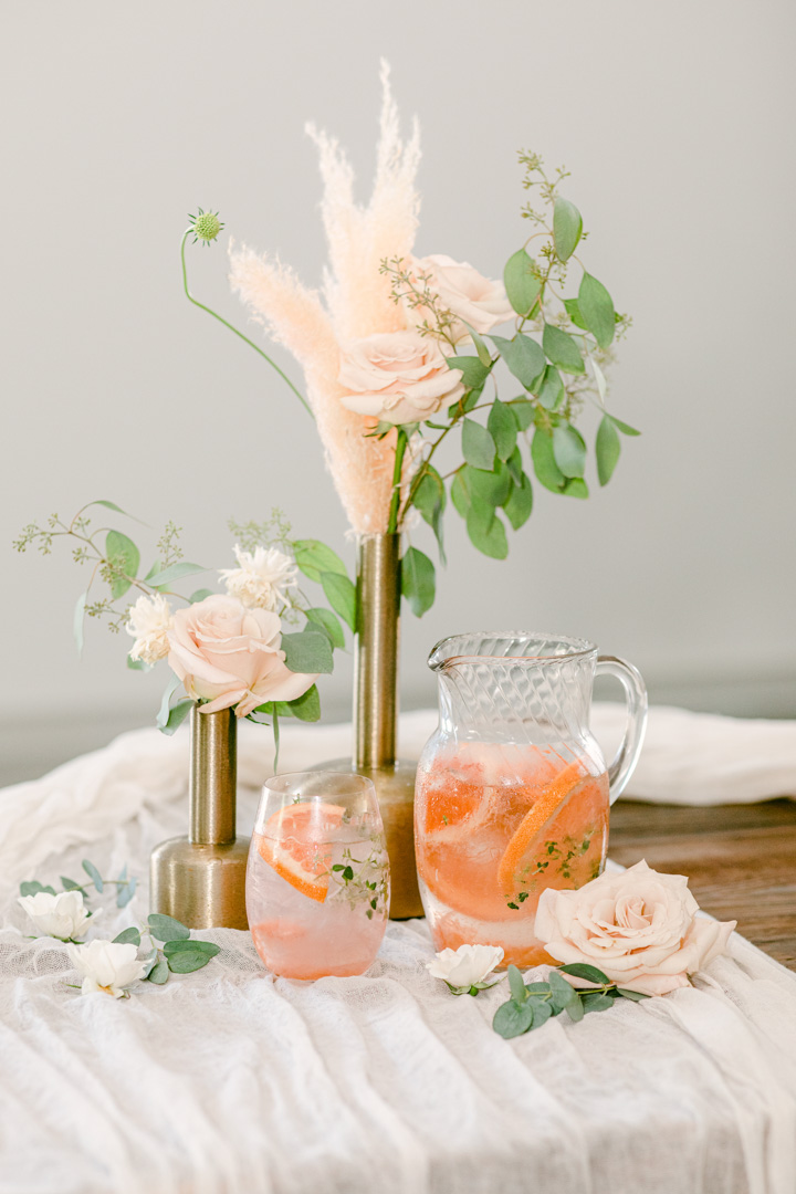 cocktail on table with flowers
