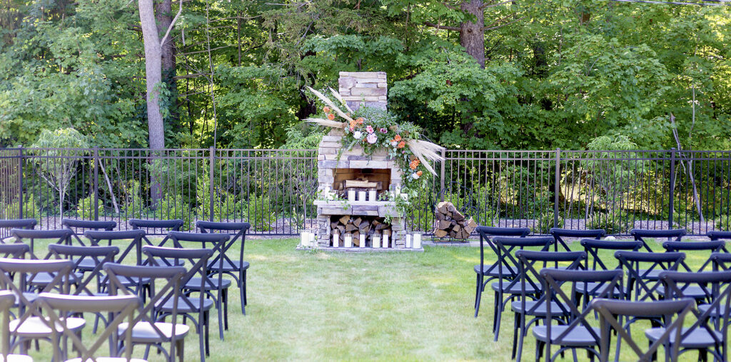 Front lawn of South Haven Creations with ceremony set up in front of the fireplace.