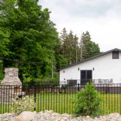 front lawn with deck and fireplace at south haven creations venue