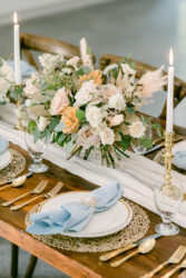 flowers on tables setting at south haven creations wedding venue