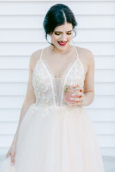 bride on deck at south haven creations wedding venue