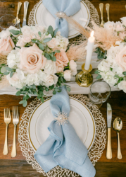 wedding tablescape with blue napkin