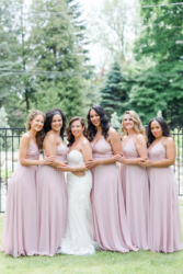 bridal party in mauve dresses with bride