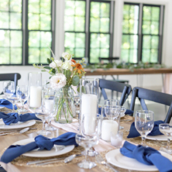 wedding table decor wood table blue napkins