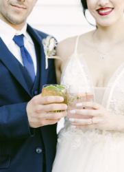 bride and groom with drinks